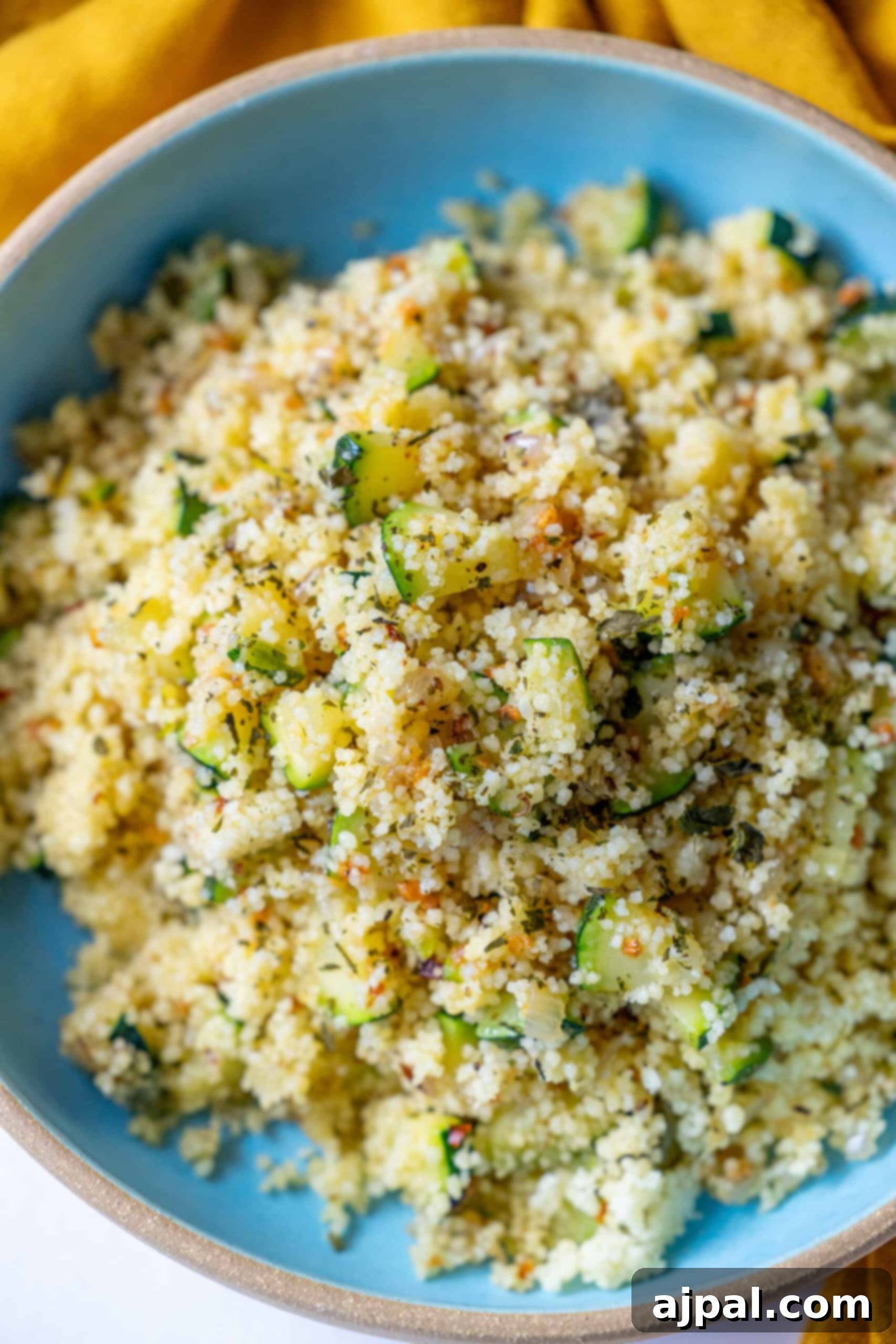 The finished zucchini couscous, perfectly mixed and seasoned, ready to be served.