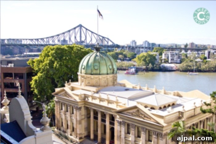 Experience Brisbane Australia 3 Panoramic view of Brisbane's modern cityscape from the Oaks Aurora Tower, showcasing the river and bustling urban life. A perfect snapshot for a Brisbane city tour.