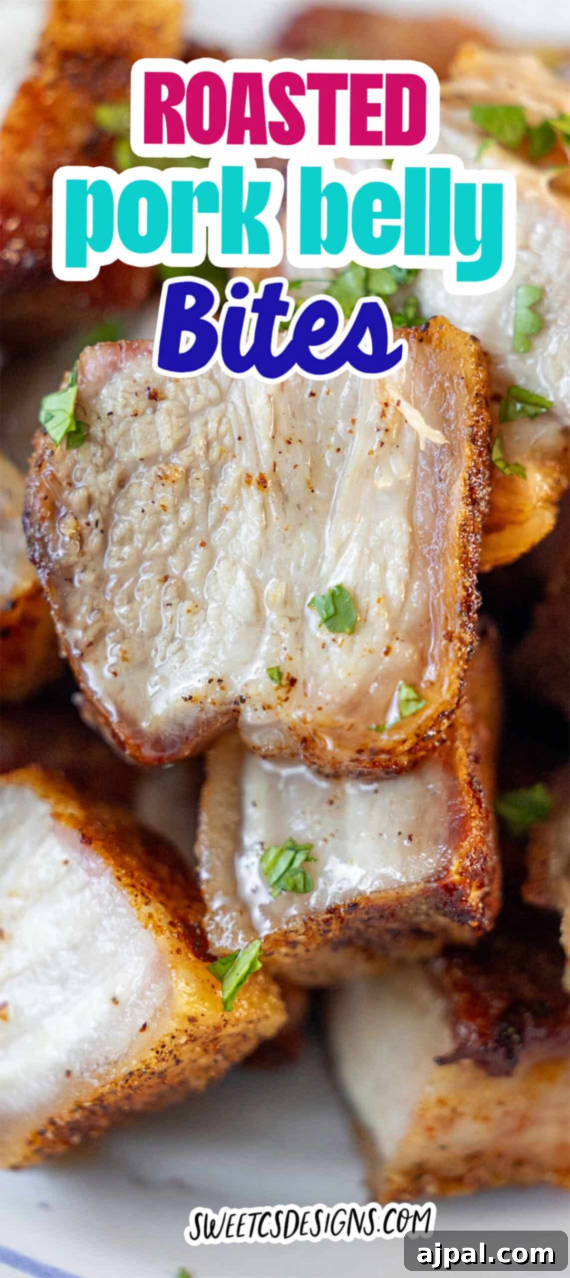 Ultimate Crispy Pork Belly 11 Close-up of crispy roasted pork belly bites garnished with chopped herbs, featuring a text overlay that reads "Roasted Pork Belly Bites". Perfectly seasoned and savory, these roasted pork belly pieces are a true delight.