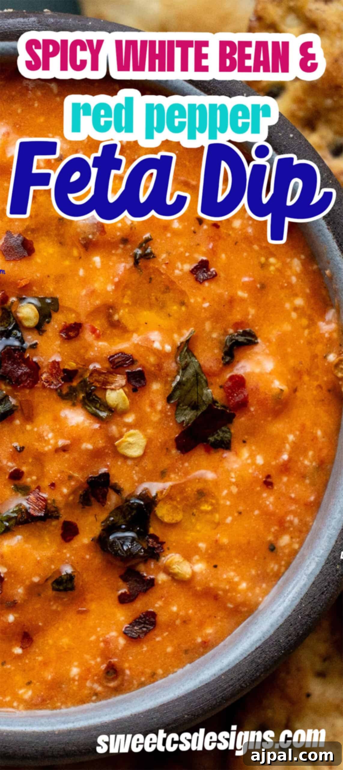 Red Pepper Feta White Bean Sensation 9 A vibrant close-up of creamy White Bean Dip infused with red pepper and crumbled feta, elegantly garnished with fresh herbs and a scattering of chili flakes in a white bowl. The image promotes this delicious Red Pepper recipe.