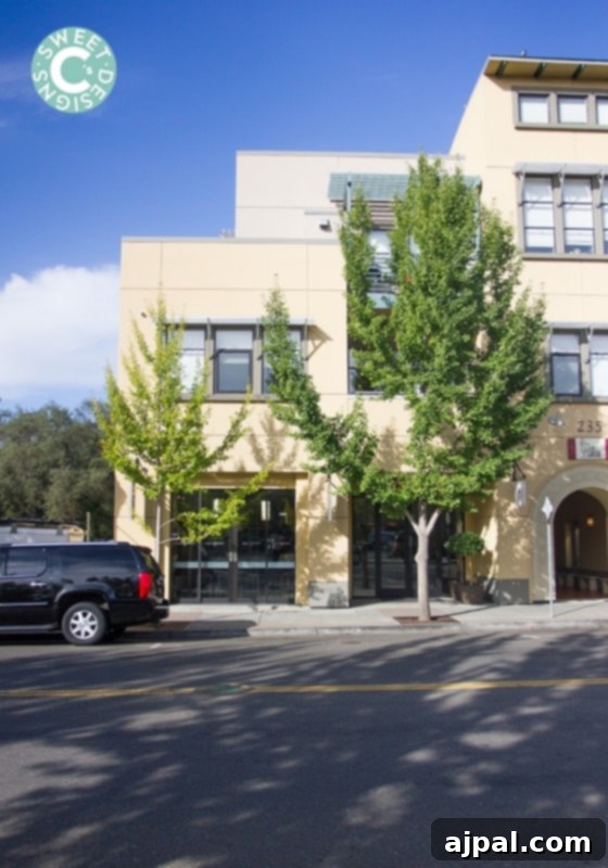 Exterior view of La Crema Healdsburg Tasting Room with a car parked, highlighting its inviting facade