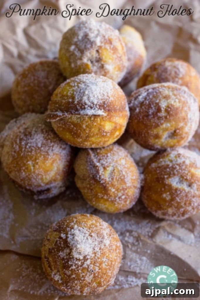 Baked Autumn Donut Gems 2 stack of donut holes covered in cinnamon and caster sugar