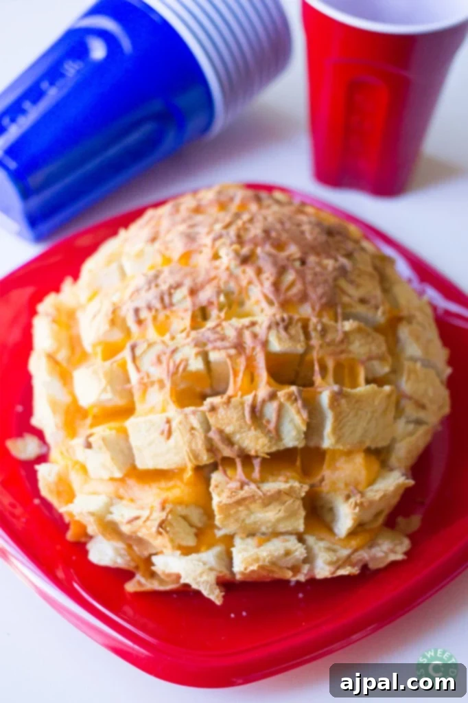 Irresistible Garlic Cheese Pull Apart 5 Cheesy garlic pull apart bread- the perfect tailgating snack!
