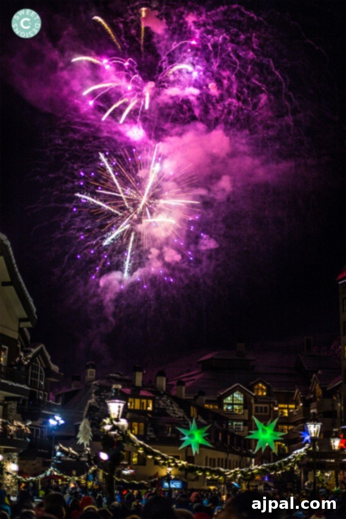 Avon Colorado Alpine Escape 4 Families and friends gather to watch New Year's fireworks over Beaver Creek Resort, a festive celebration in Avon, Colorado.