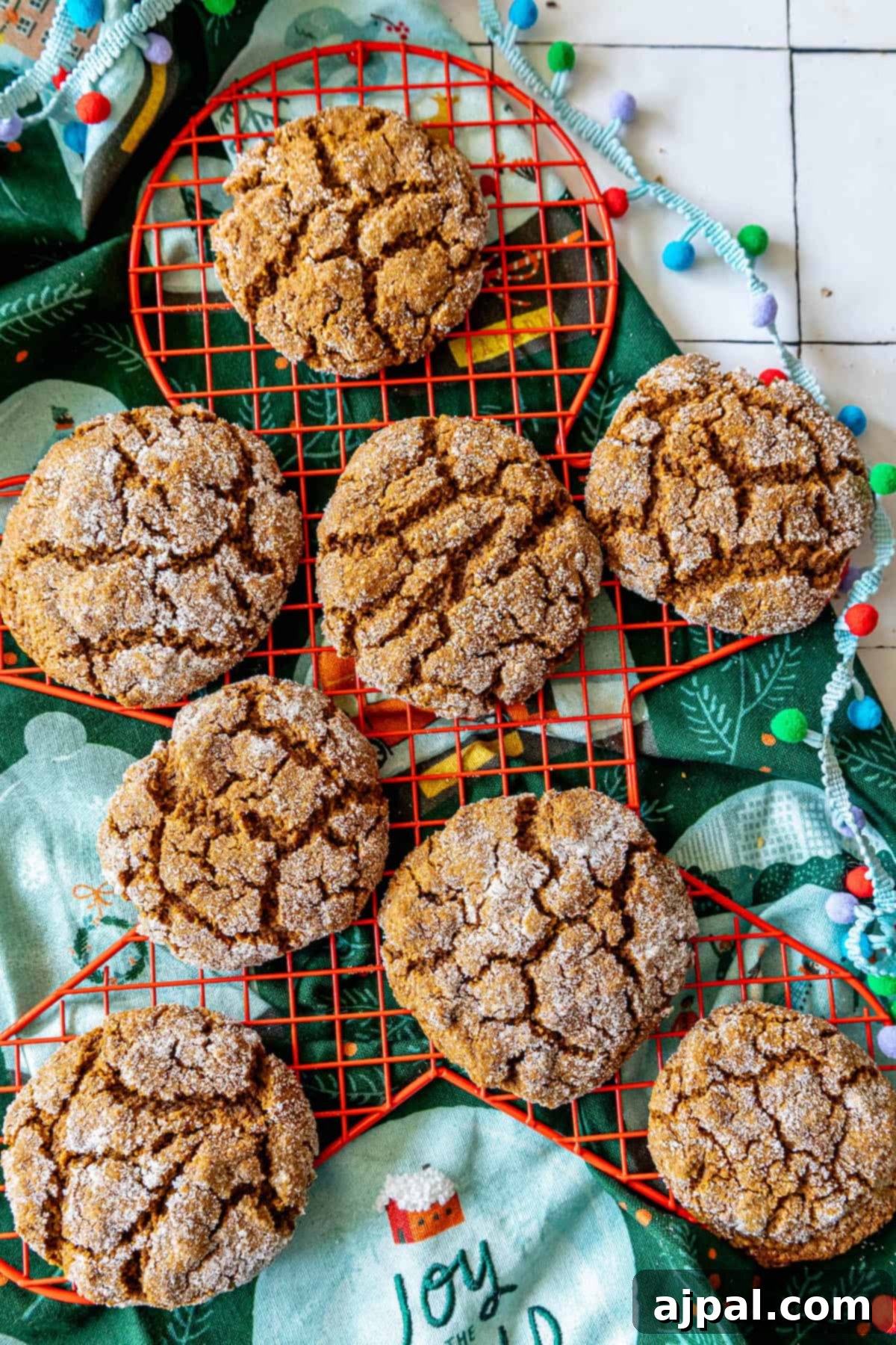 Spiced Molasses Chews 11 Gingerbread cookies on a cooling rack - Chewy Molasses Cookies.