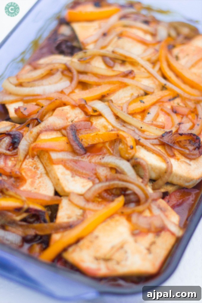 Hearty Paleo Vegan Enchilada Bake 3 A savory Paleo Vegan Enchilada Casserole, baked to perfection in a pan, featuring layers of bell peppers and other wholesome vegetables. This satisfying dish offers a delicious, meat-free solution for any meal.