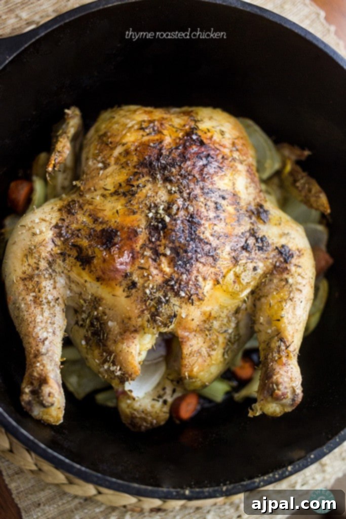 Perfect Thyme Roast Chicken 6 A Thyme Roast Chicken cooked in a cast iron skillet.