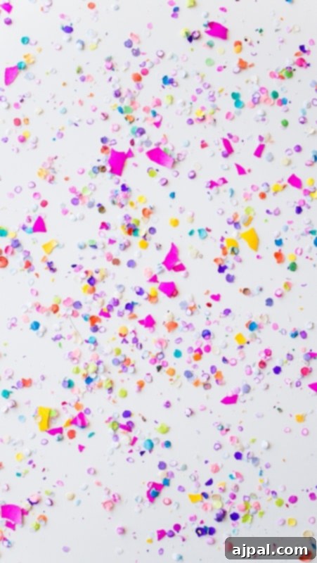 Festive Confetti-filled iPhone Wallpaper Designs for a lively Spring screen.
