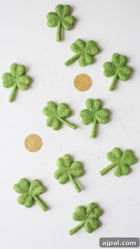 Elegant St Patrick’s Day iPhone wallpaper designs featuring delicate crochet shamrocks.
