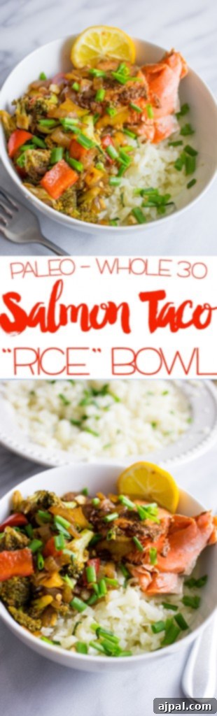 Paleo Salmon Taco Power Bowls 6 A bowl of paleo salmon taco bowls with cauliflower rice, shown to be a healthy and delicious option for those following a whole 30 diet.