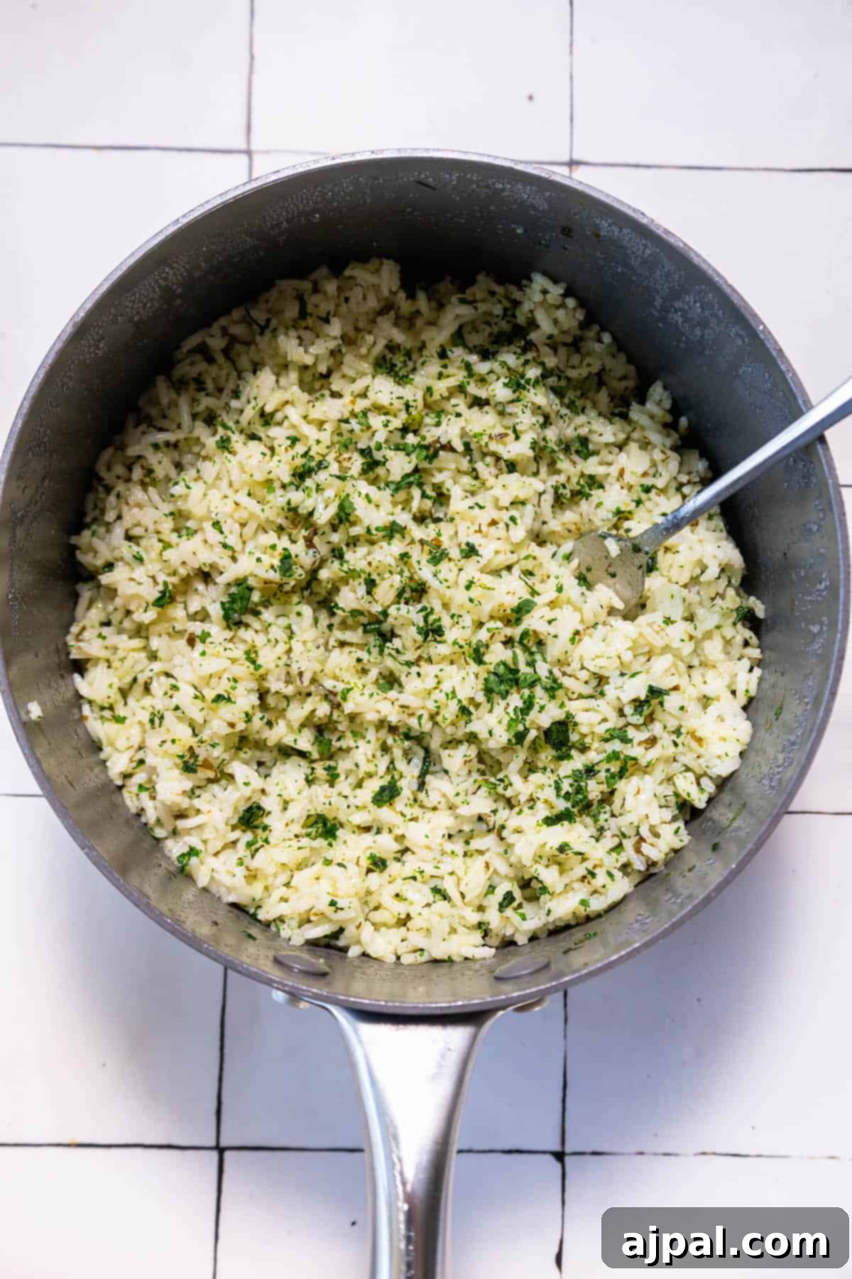 Zesty Chipotle Lime Rice 9 A frying pan filled with Chipotle knockoff cilantro lime rice.