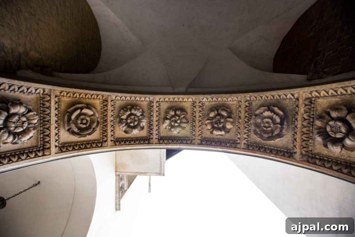 Discovering Krakow's Wawel Castle and Cathedral 11 Intricate detailing on an archway within Wawel Castle in Krakow, showcasing historical craftsmanship