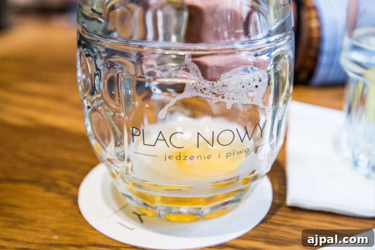 A glass of beer on a table at Plac Nowy 1 in Krakow's Jewish District