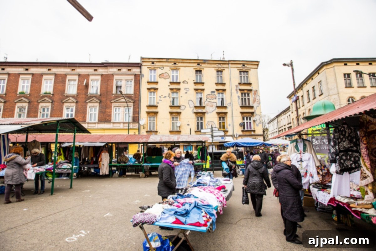 A bustling flea market in Plac Nowy, Krakow’s Jewish District, showcasing a lively scene of vendors and shoppers.