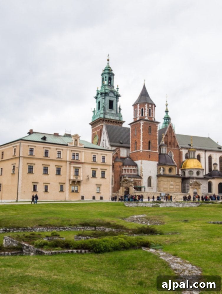 Krakow: Poland's Royal City 21 A grand castle overlooking a sprawling green field in Krakow, one of Europe's favorite historical sites.