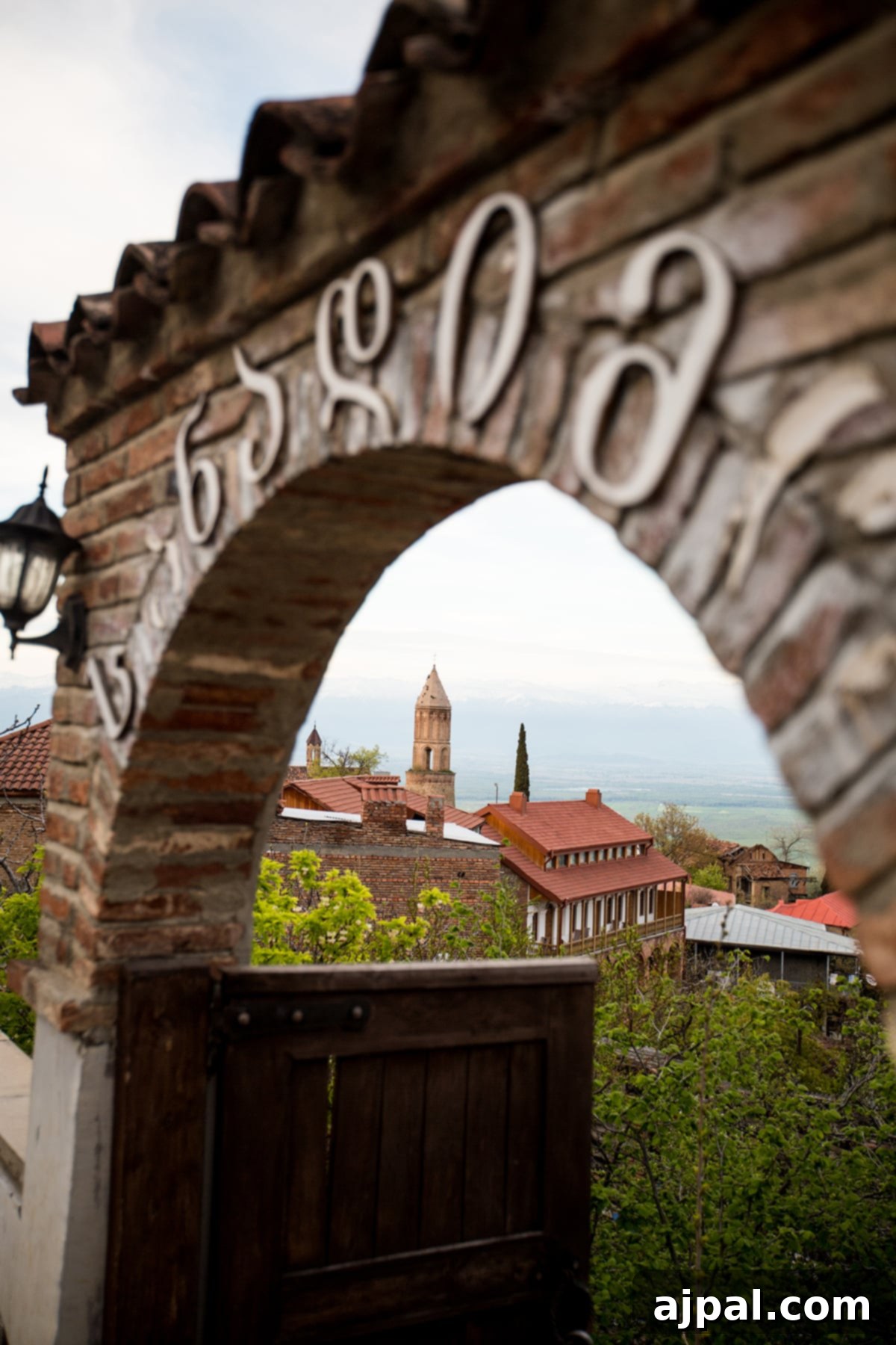 Historic town gate in Sighnaghi, Georgia, inviting visitors to explore