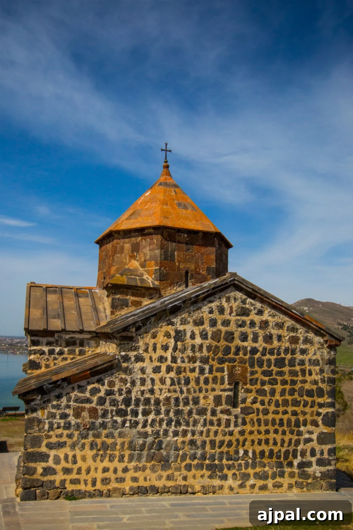 Sevanavank Monastery, an ancient church overlooking Lake Sevan under a clear blue sky, located north of Yerevan, Armenia.