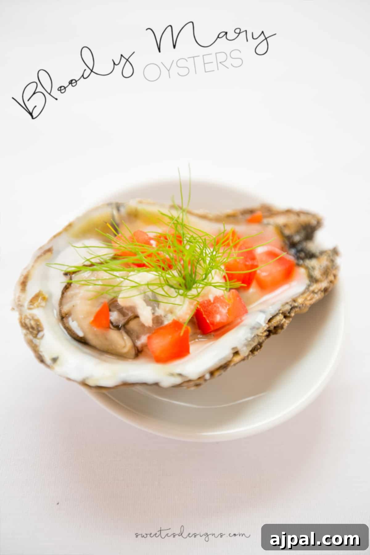 A beautifully arranged plate of oysters adorned with diced tomatoes and fresh dill, perfect for an elegant brunch.