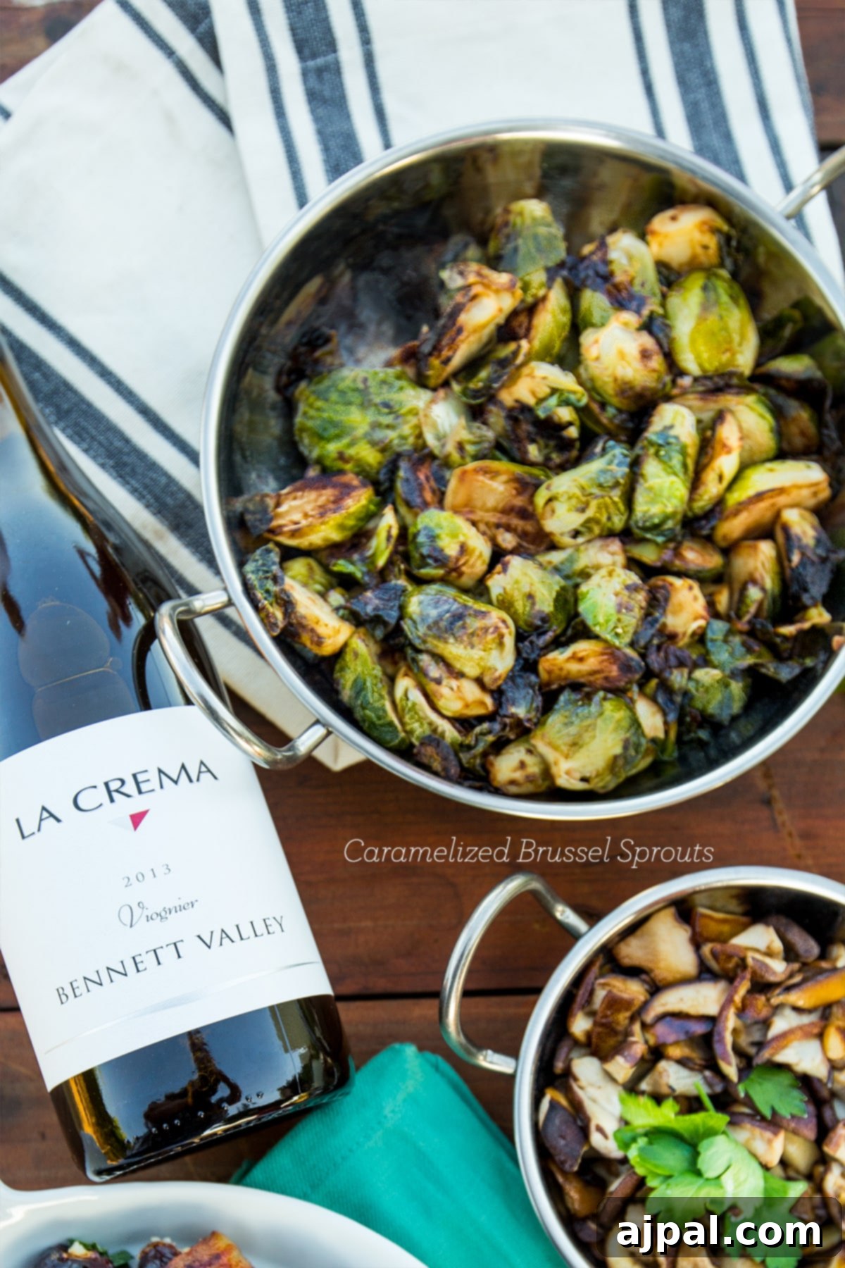 Caramelized Brussels sprouts with wine and mushrooms cooking in separate pans on a stove