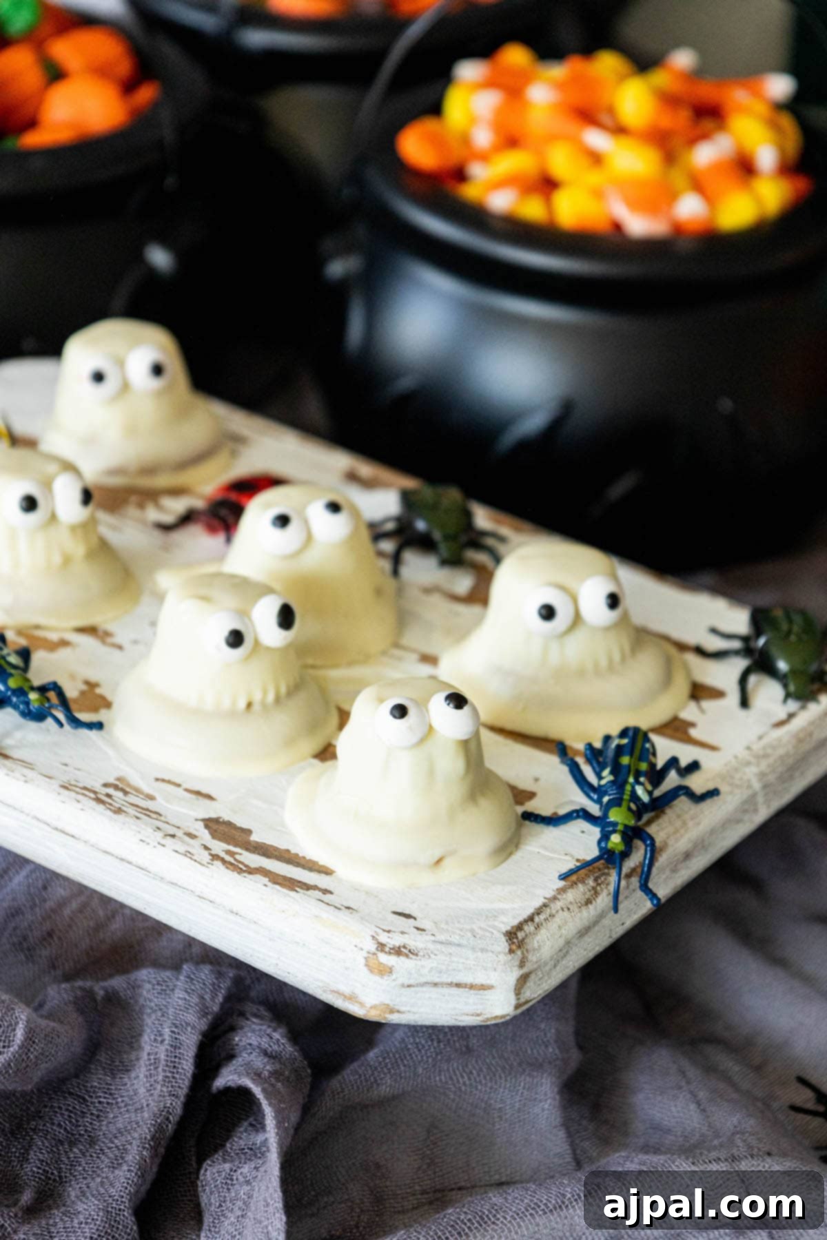 Spooktacular Halloween Treats You Need to Try 11 Recipe for white chocolate dipped ghost cookies.