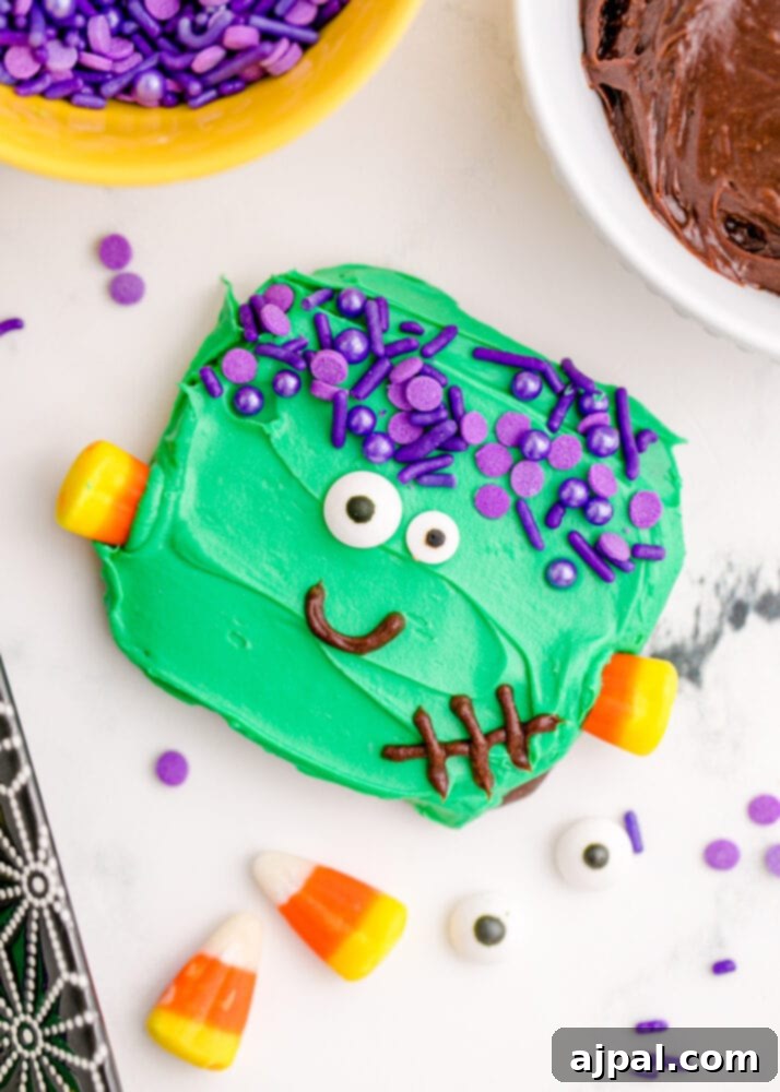 Spooktacular Halloween Treats You Need to Try 9 A Halloween cookie with green frosting and candy canes, perfect for easy Frankenstein cookies.