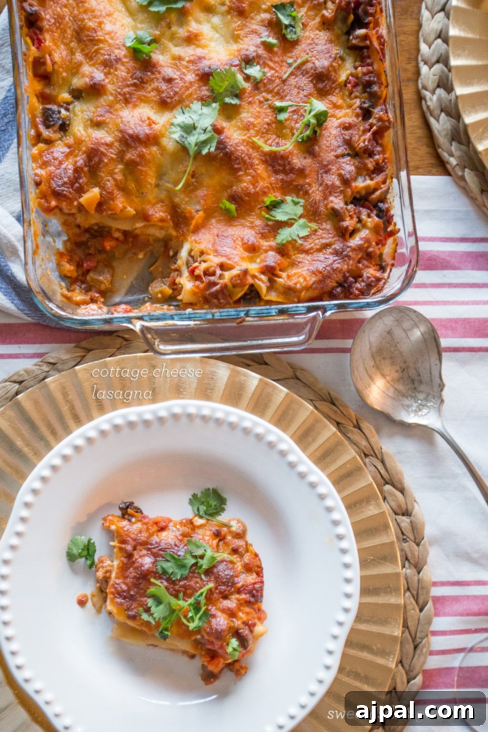 A perfectly portioned slice of cottage cheese lasagna on a white plate