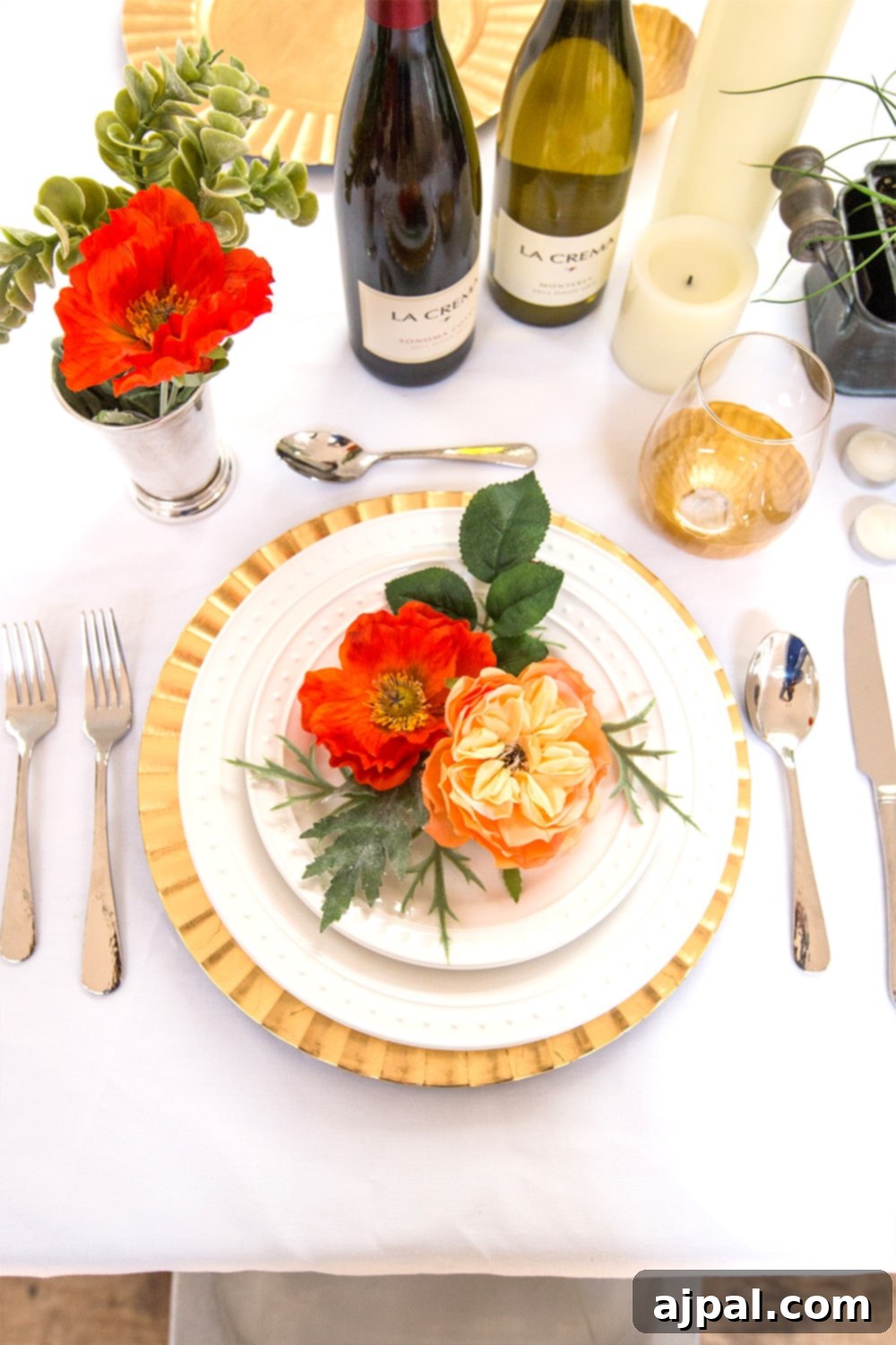 Effortless Herbal Table Decor 4 A table setting with easy herb centerpieces and a bottle of wine.