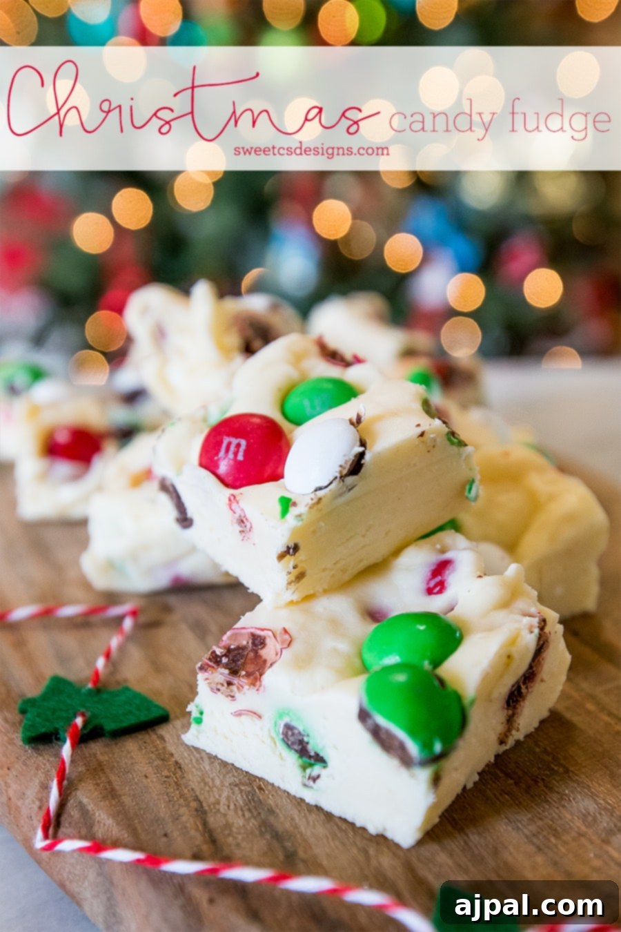 Festive Confectionery Fudge 4 Delicious Christmas candy fudge generously studded with colorful candies, arranged on a wooden board ready for serving.