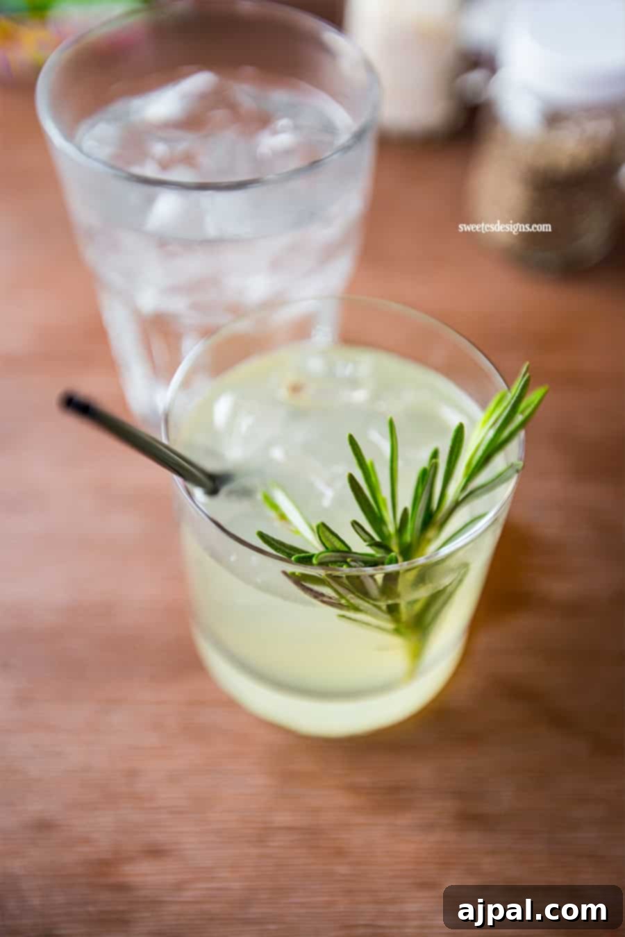 Four Seasons Orlando at Disney World A Magical Getaway 14 The refreshing Skinny Dip Cocktail, garnished with rosemary, served at Four Seasons Orlando.