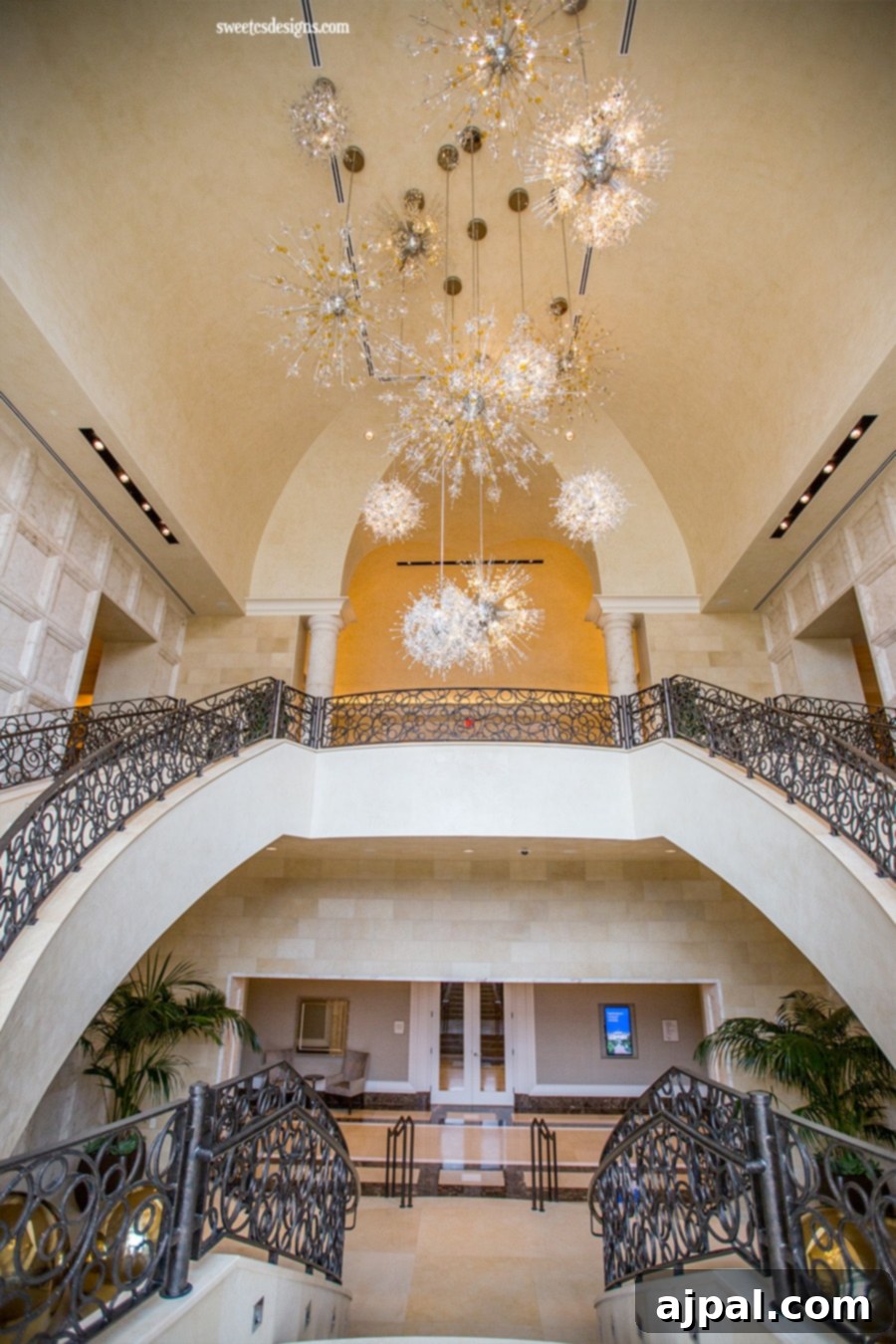 Four Seasons Orlando at Disney World A Magical Getaway 3 Staircase adorned with a stunning chandelier in the Four Seasons Orlando lobby