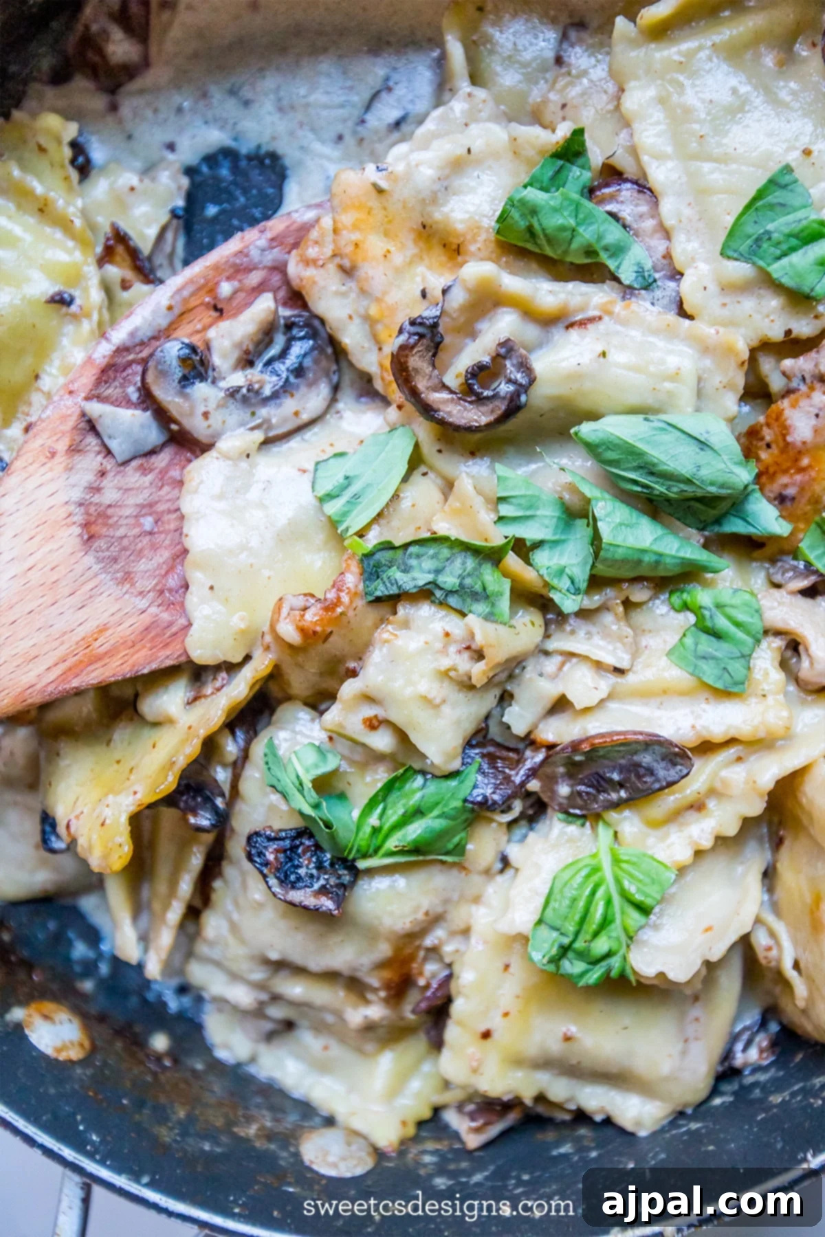 Delicious Skillet Ravioli Stroganoff served hot, topped with fresh basil