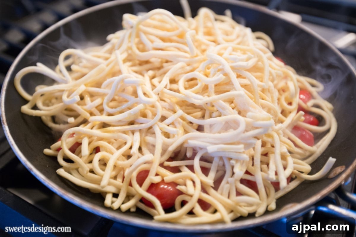 Easy one-pot spaghetti and tomatoes in a skillet.