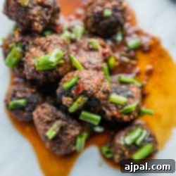Sticky Vegan Hoisin Meatballs 7 Vegan hoisin meatballs plated.