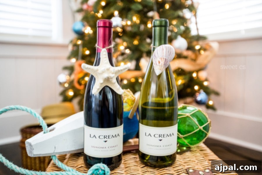 Easy Seashell Tree Decorations for a Coastal Vibe 10 Two bottles of wine nestled in a rustic basket, charmingly adorned with easy DIY seashell ornaments, placed next to a beautifully decorated beach-themed Christmas tree.