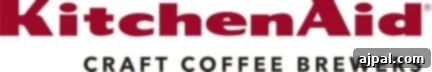 Coffee-Infused Bread Pudding 4 KitchenAid logo, representing quality and innovation in kitchen appliances.