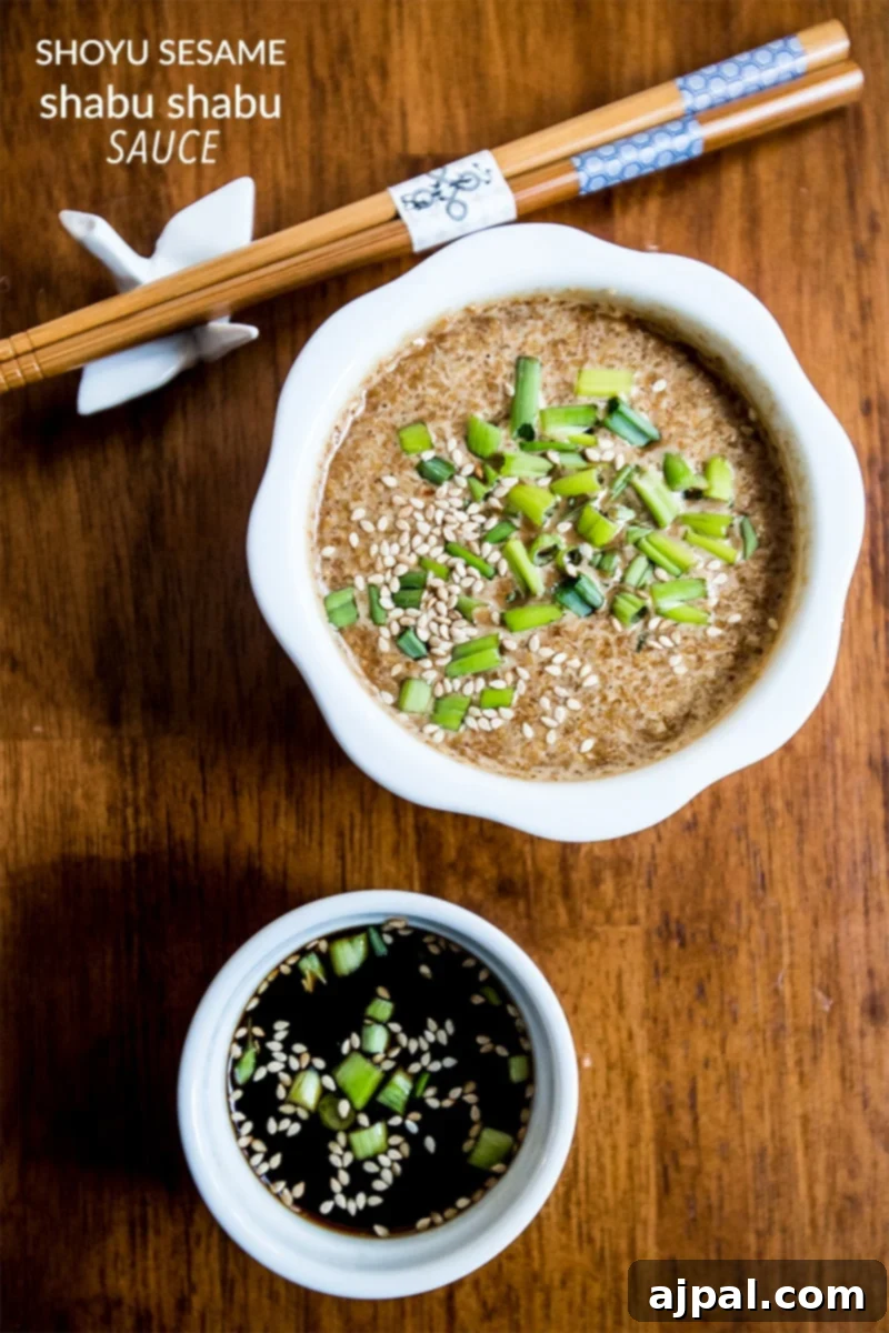 A bowl of shabu shabu dipping sauce with sesame seeds and green onions, accompanied by chopsticks in the background.