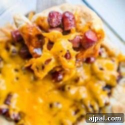 Hearty Cheesy BBQ Smokie Bake 10 An easy, cheesy casserole with little smokies and BBQ flavors reminiscent of a slice of pizza.