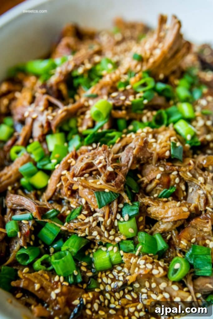 This slow cooker pulled pork is so delicious and easy - tons of flavor from the crock pot