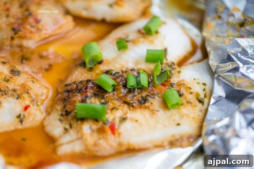 Spicy Garlic Soy Glazed Flounder 5 flounder in a foil pouch with spices and sauce and green onions