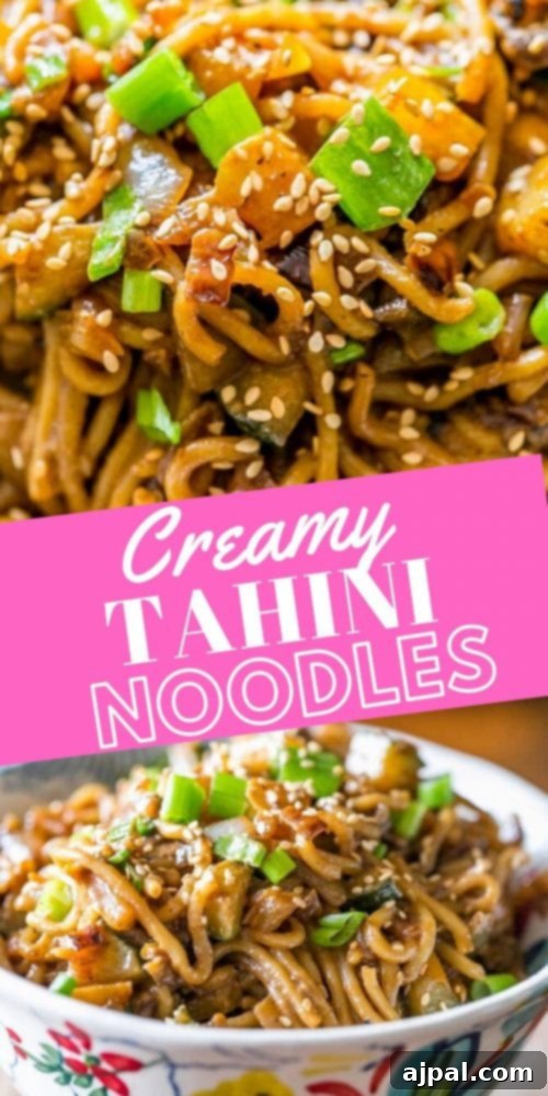 Velvety Tahini Noodles 10 A bowl of rich, creamy tahini noodles generously covered in sesame seeds, ready to be enjoyed.