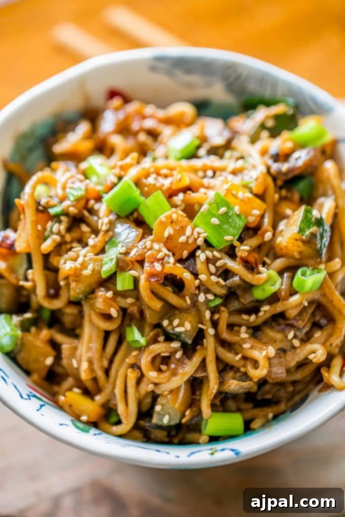 Velvety Tahini Noodles 6 Rich, creamy vegan tahini noodles with sesame seeds, showcasing the dish's delicious Asian-inspired flavors.