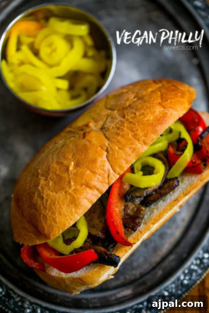 A close-up of a spicy vegan portobello burger, showcasing its rich texture and vibrant colors, served on a plate.