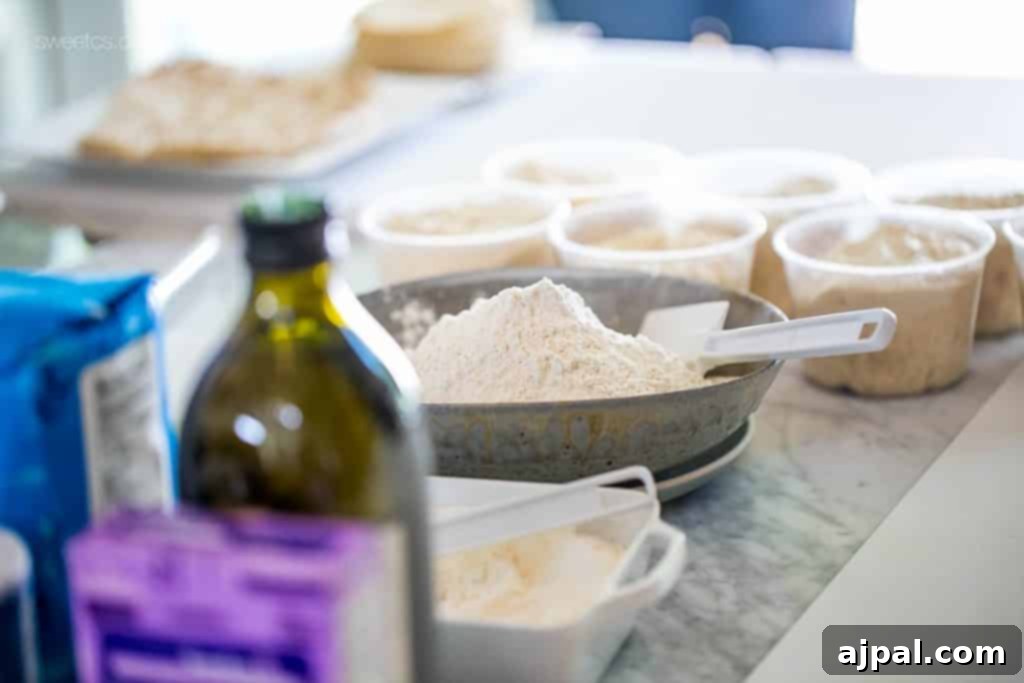 DIY Flatbread Pizza Party My Culinary Adventure with Tiffani Theissen 12 Hands preparing flatbread dough for a fun, interactive DIY flatbread making party.