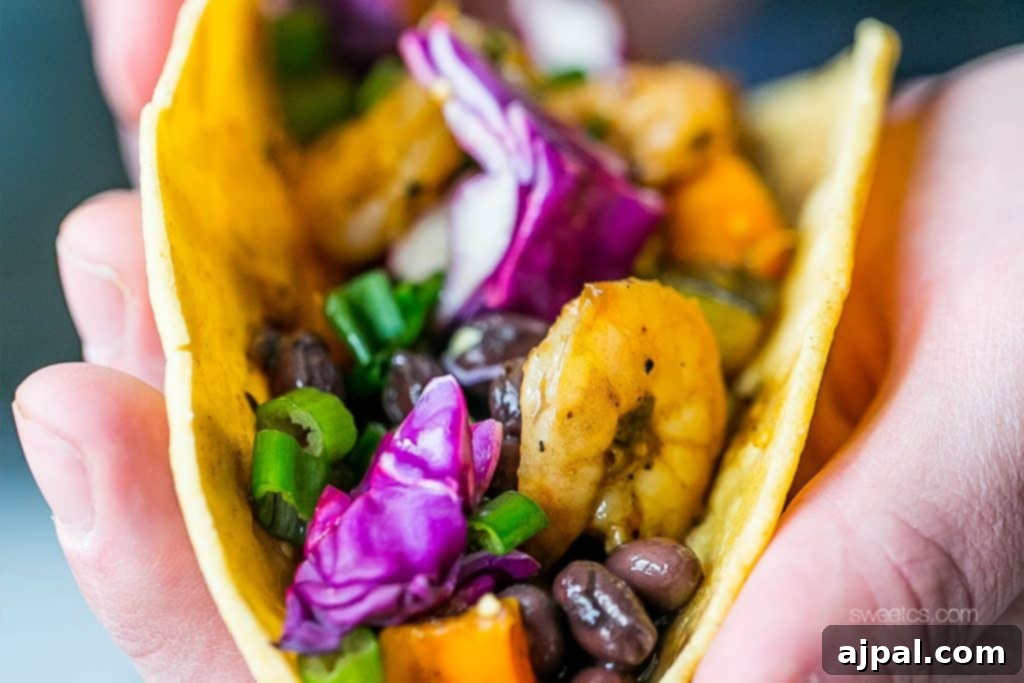 Delicious Roasted Habanero and Tomatillo Shrimp Tacos with fresh toppings, showcasing vibrant colors and textures.
