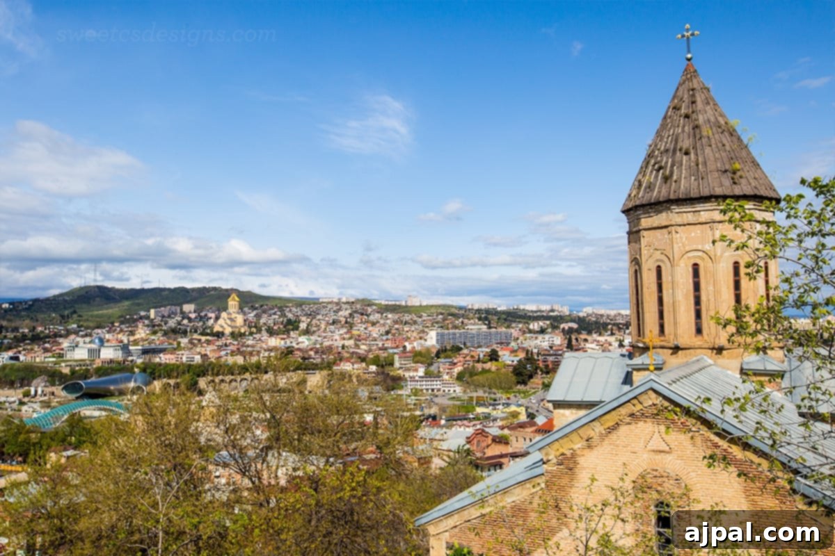 Upper Bethlehem Cathedral with Sameba in the background, Tbilisi Georgia copy