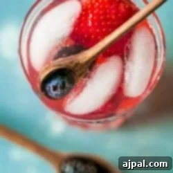 Berry Basil Garden Sparkler 10 A refreshing sparkling lemonade infused with berries and adorned with ice.