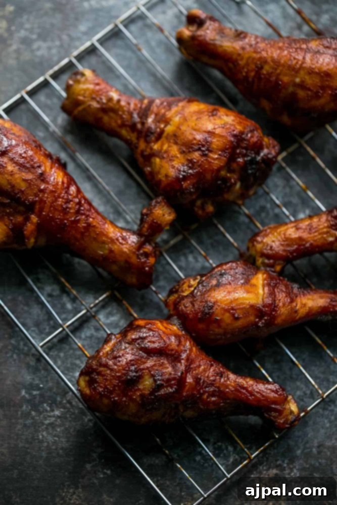 Picture of baked bbq chicken legs on wire rack