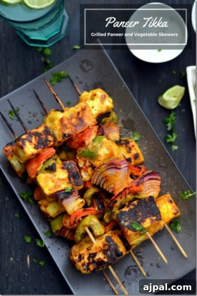 Grilled Tikka Paneer and Vegetable Kebabs 2 Grilled Paneer and Vegetable Skewers with fresh lime and cilantro