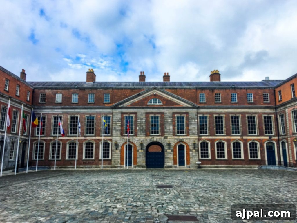 Dublin Awaits Top Reasons and Essential Experiences 14 The impressive architecture of Dublin Castle, featuring a blend of medieval and Georgian styles, under a bright sky.