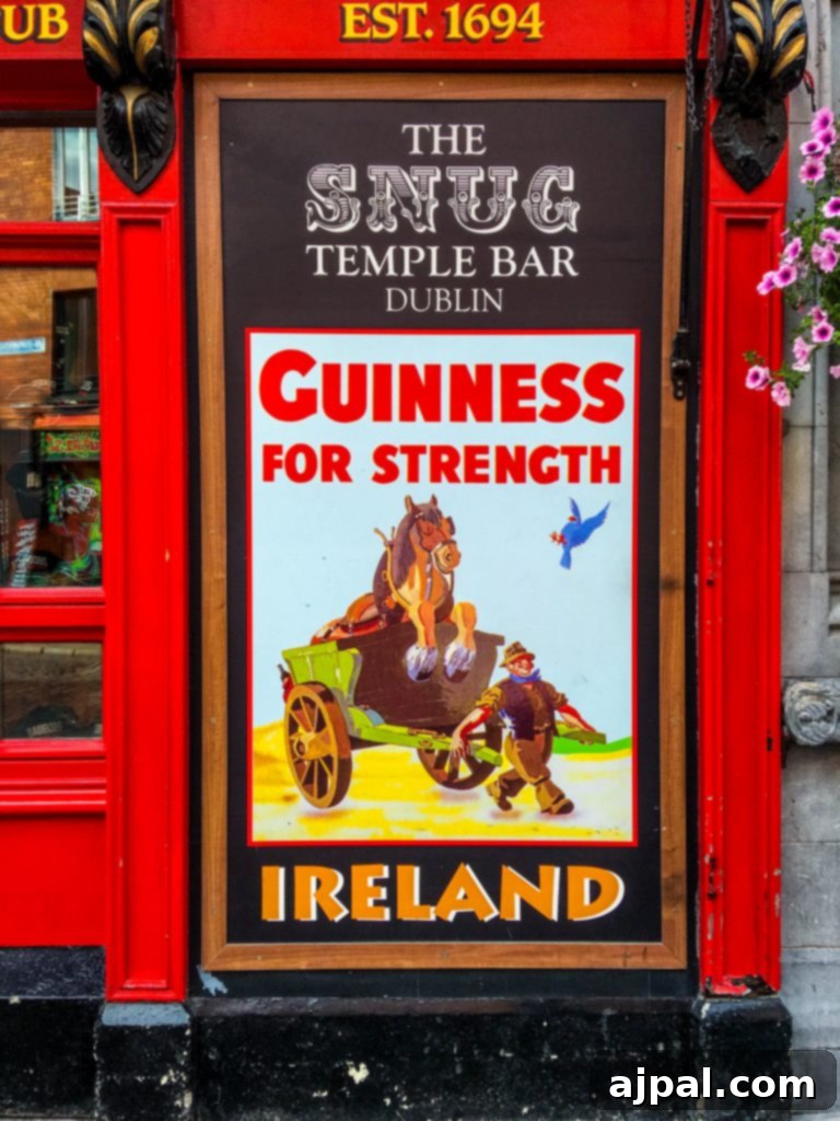 Dublin Awaits Top Reasons and Essential Experiences 7 An iconic Guinness sign adorning a historic building in Dublin, signaling the famous brewery.